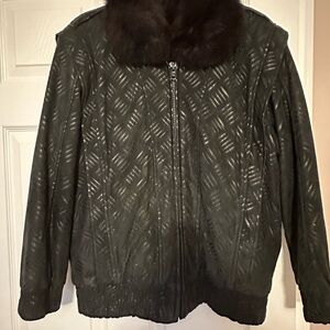 Black Leather Jacket with removable fur liner and collar.